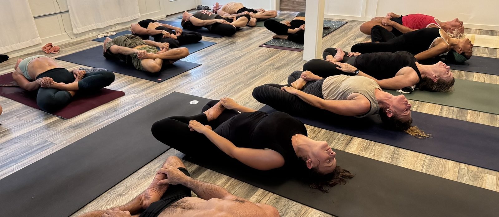 A led Ashtanga class resting between postures at Shala Santosha on Maui